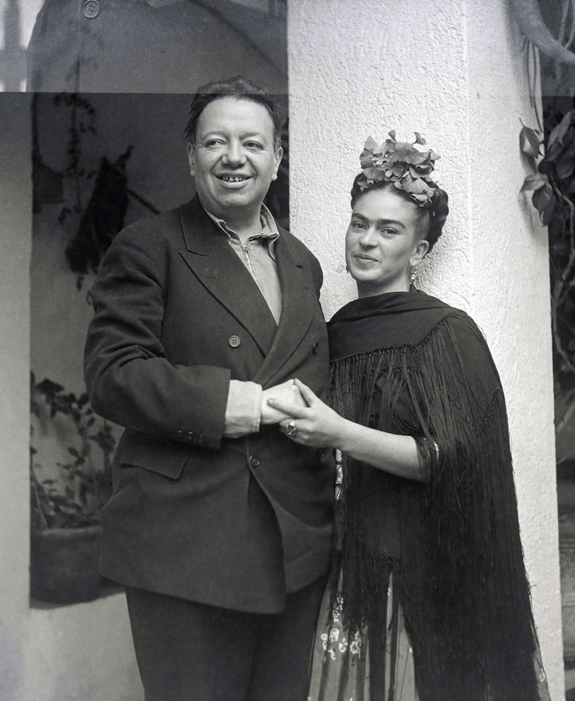Black and white photograph of Diego Rivera and Frida Kahlo standing together